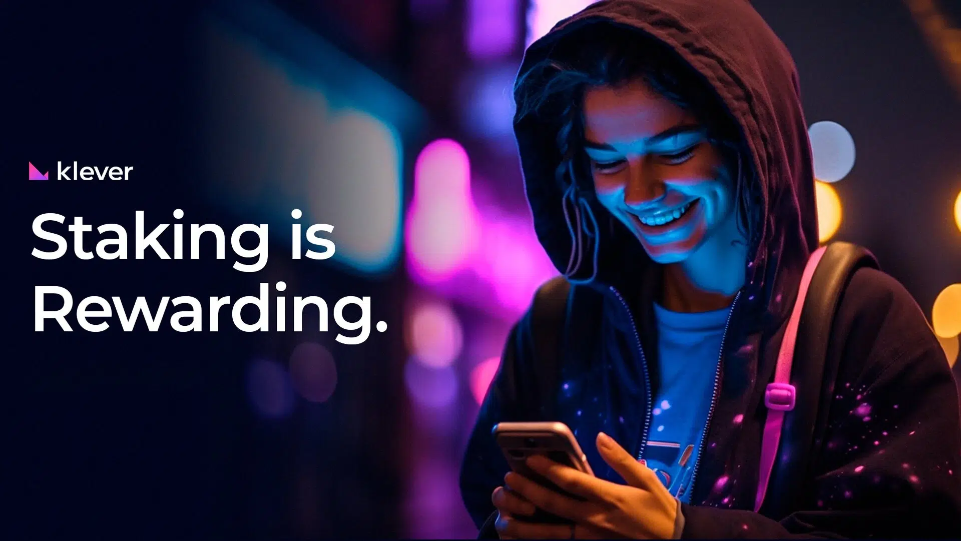 A girl looking at her phone smiling at her staking harvest on Klever Wallet

